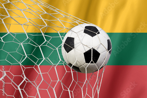 Lithuania flag and soccer ball, football in goal net