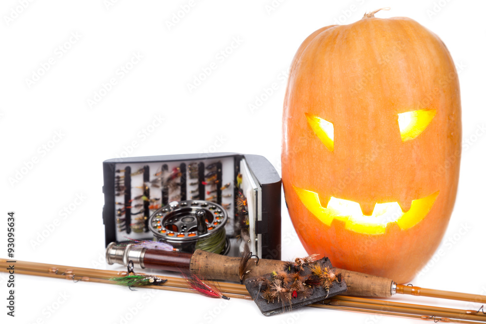 halloween pumpkin with fly-fishing on white - obrazy, fototapety, plakaty 
