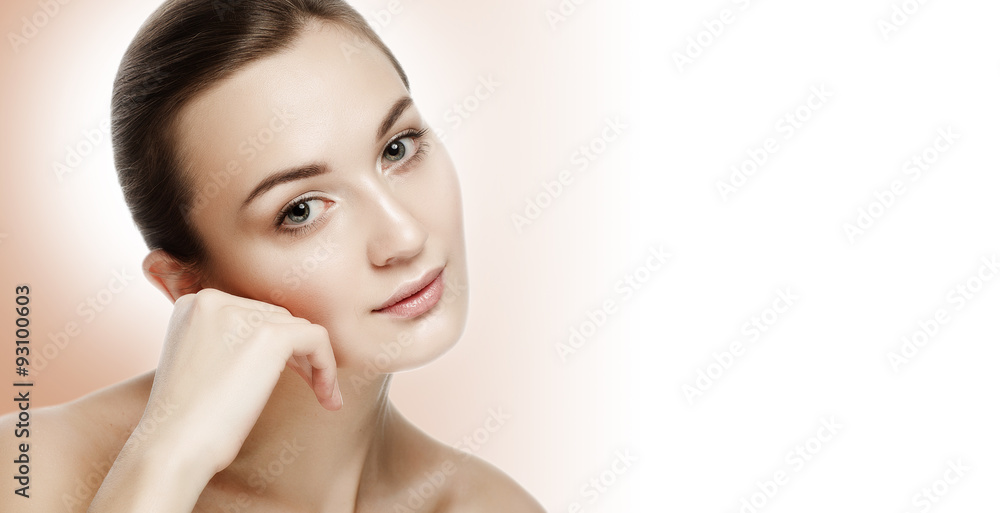 Naklejka premium Beauty Portrait Beautiful Young Woman Touching Face