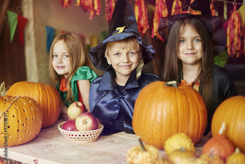 Portrait of children dressed in Halloween costumes.
