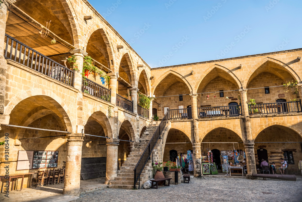 NICOSIA, CYPRUS - AUGUST 10, 2015: Buyuk Han (The Great Inn) a touristic center with an antique souvenir shops, craft workshops and cafes in Nicosia, Cyprus on August 10,2015