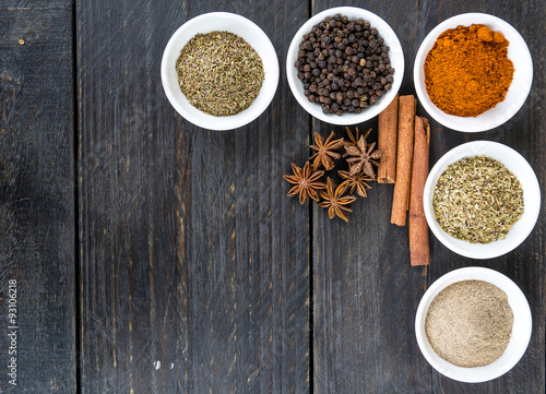 Fototapeta Naklejka Na Ścianę i Meble -  Spices and herbs in  bowls.