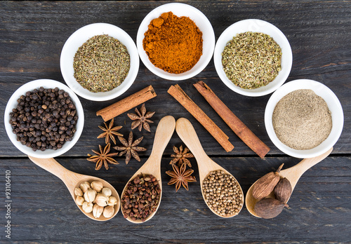 Spices and herbs in bowls.