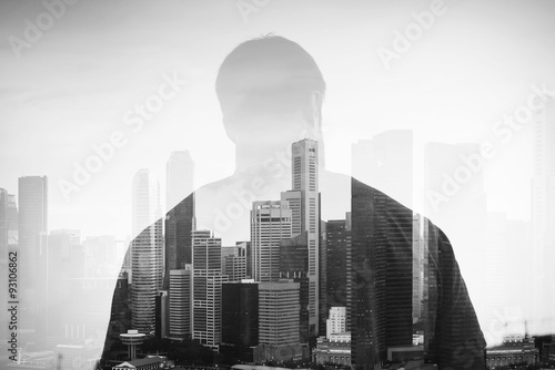 Double exposure of young man and panoramic view on the