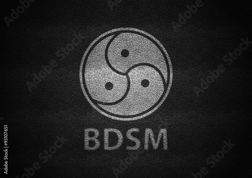 Bdsm sign white embossed on black leather