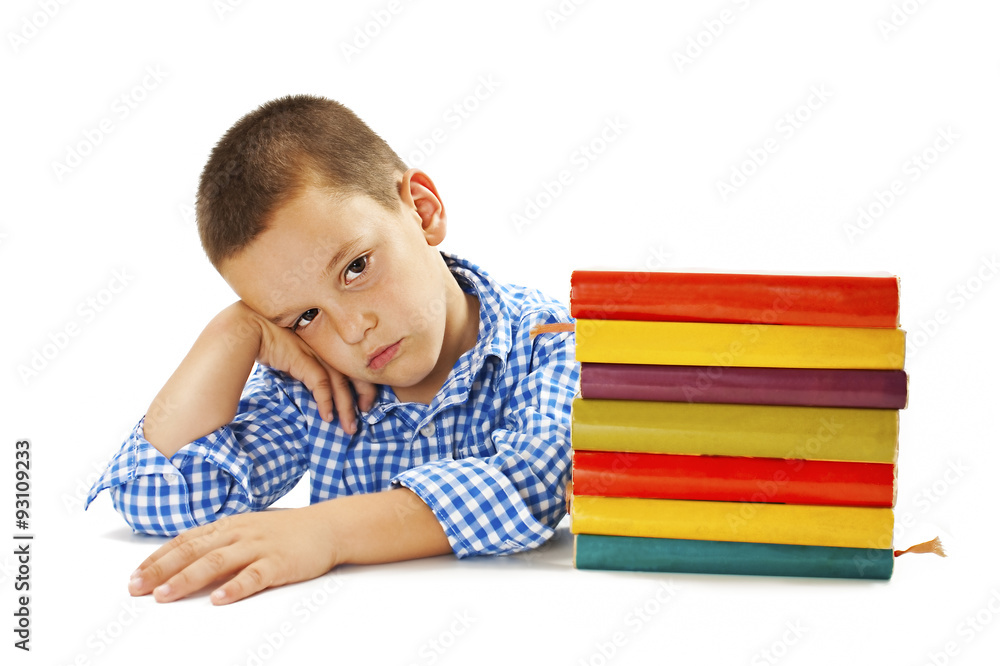 Tired schoolboy with learning difficulties. Isolated on white background Tired schoolboy with learning difficulties. Isolated on white background