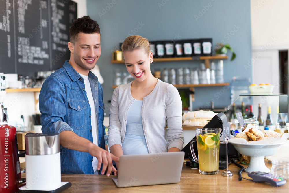 Small business owners in coffee shop Small business owners in coffee shop