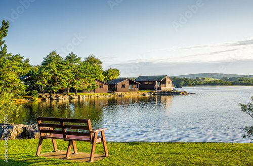 Holiday park with wooden lodges.