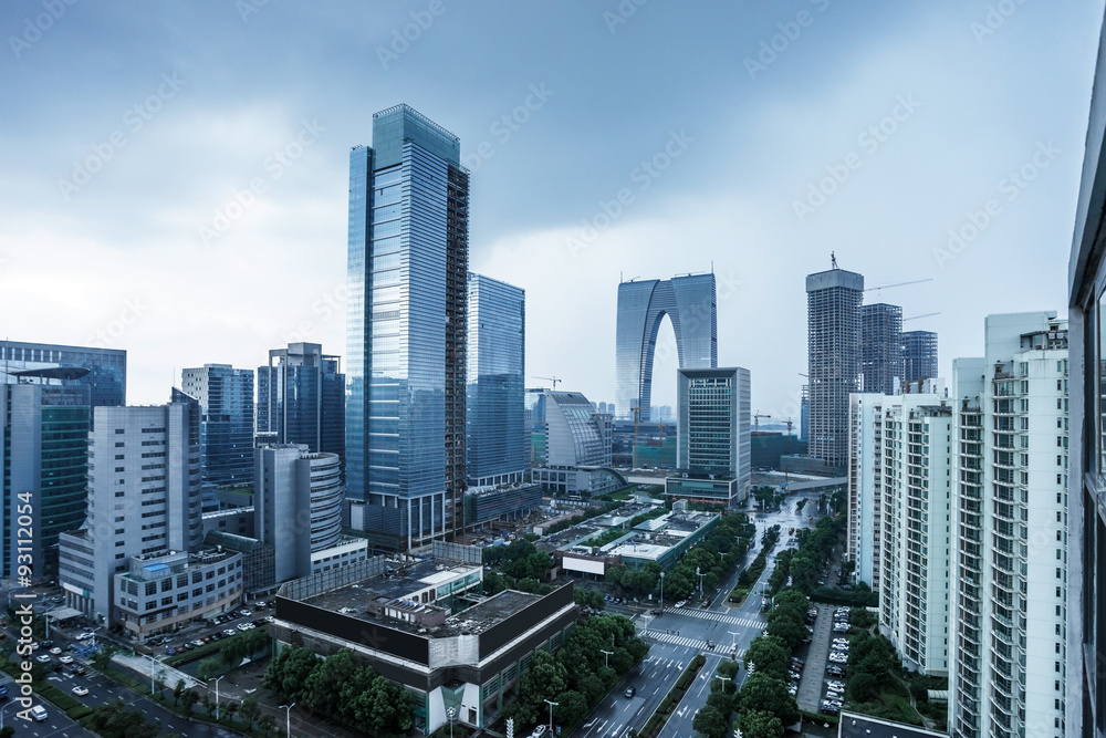 Obraz premium skyscrapers and mansions of a modern city