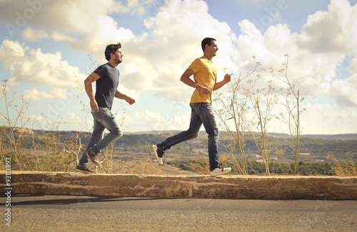 Two men running