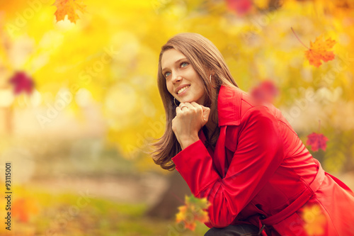 Beautiful young brunette woman portrait in autumn