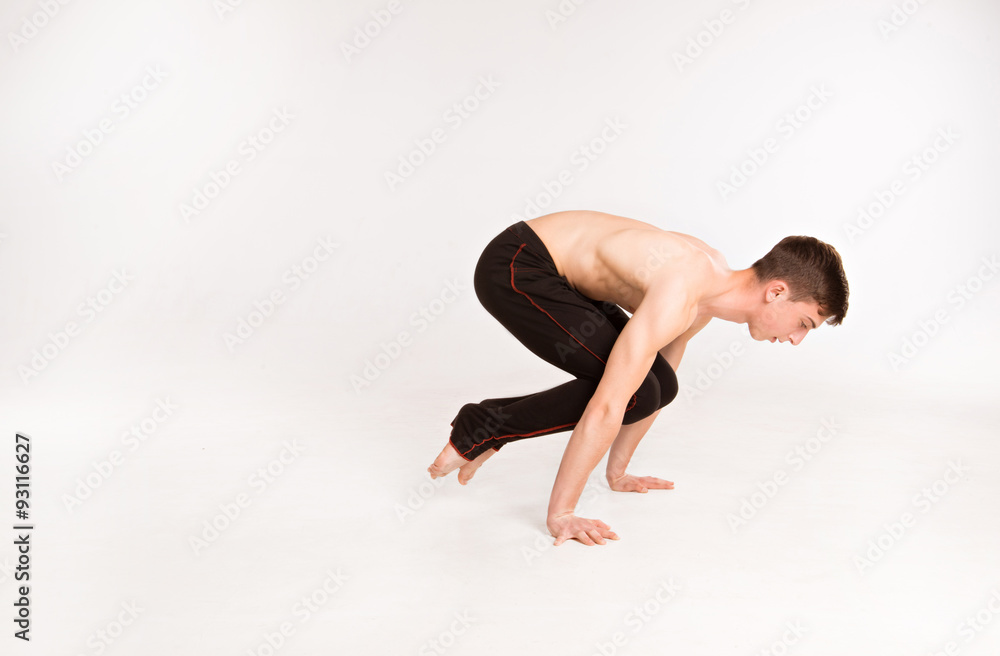 slender man doing gymnastic exercises.