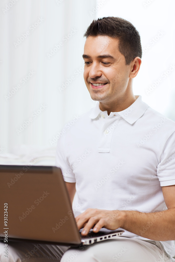 happy man working with laptop computer at home happy man working with laptop computer at home