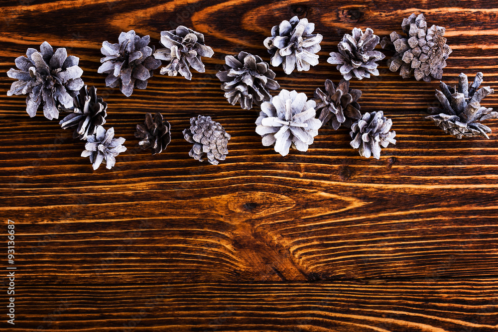 Xmas holiday background with pinecones