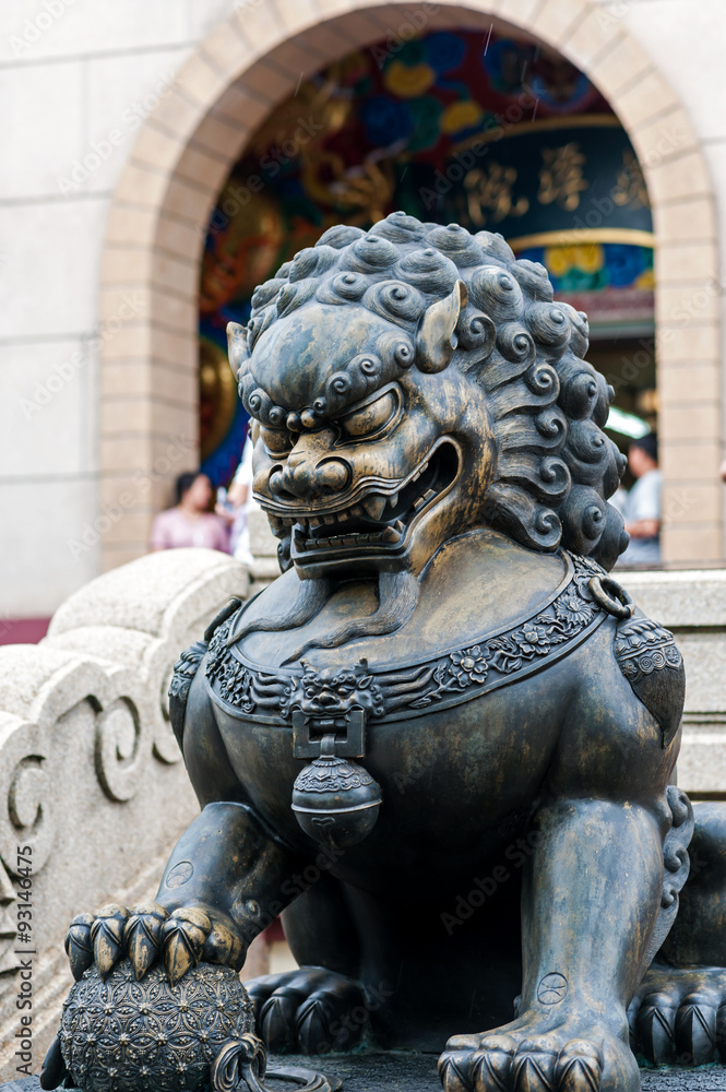 Lion statue in nature place soft light