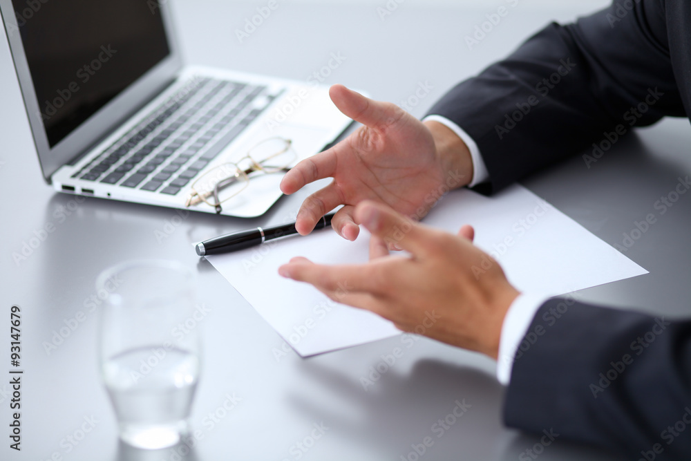 Close-up of male hands with pen over document,  business concept