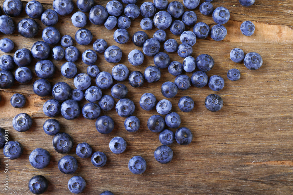 Fresh blueberries on wooden table, closeup Fresh blueberries on wooden table, closeup