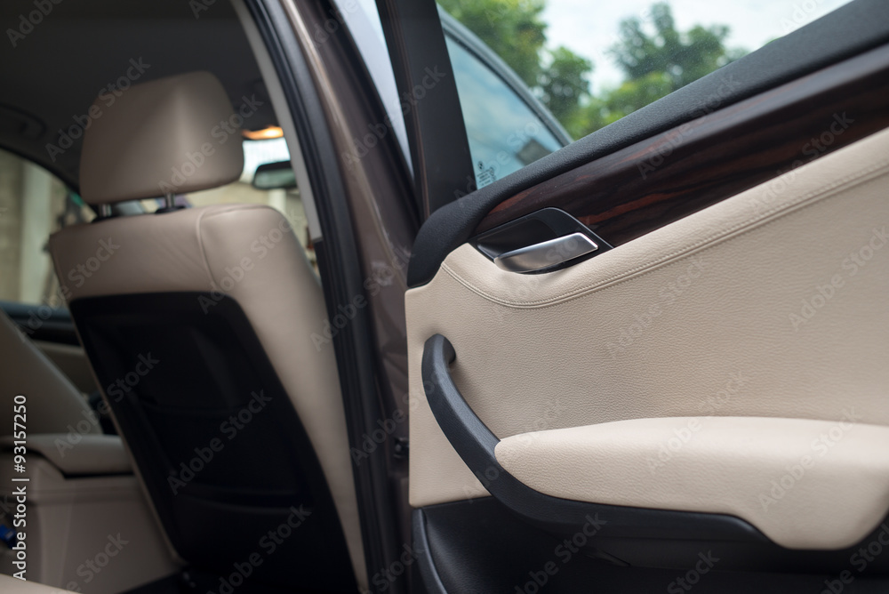 Door of luxury car with white leather Door of luxury car with white leather