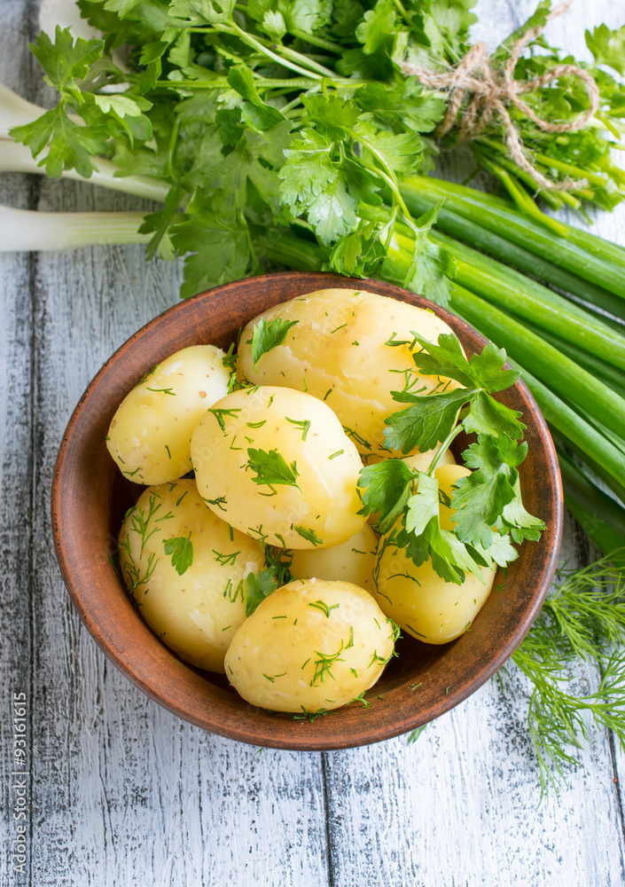 Young boiled potatoes with dill, parsley and onions Young boiled potatoes with dill, parsley and onions