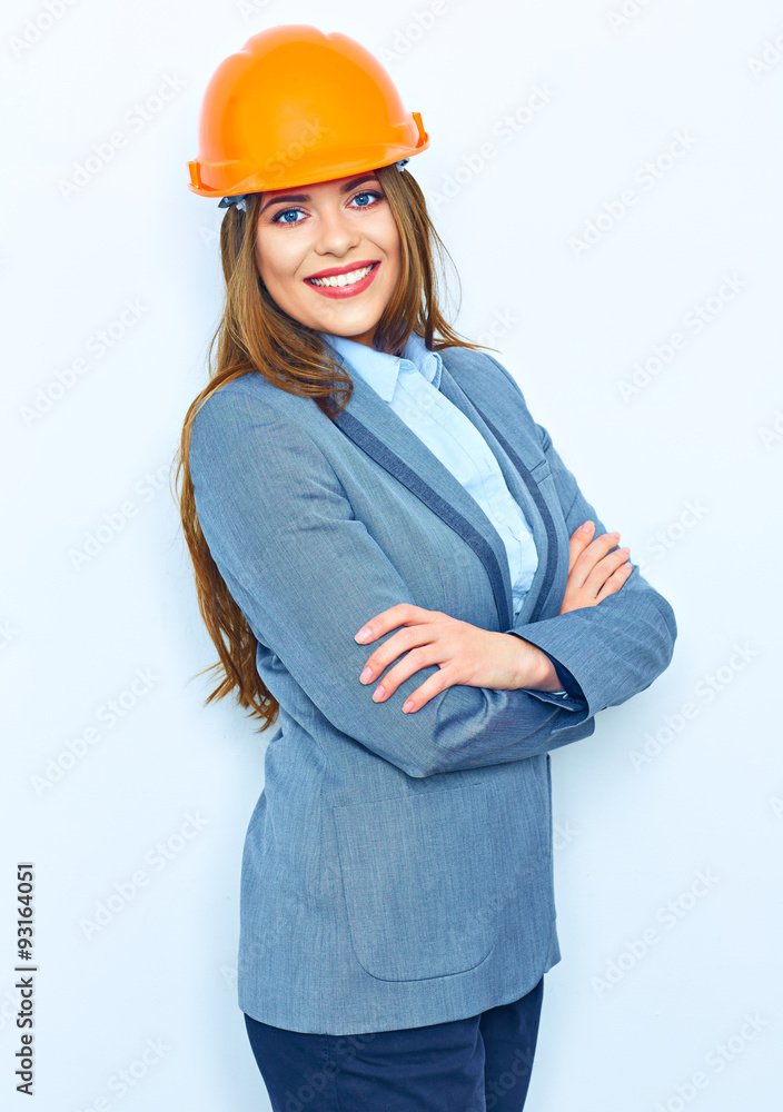 Arhcitect business woman standing against white wall with cross Arhcitect business woman standing against white wall with cross