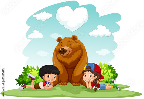 Children sitting with bear