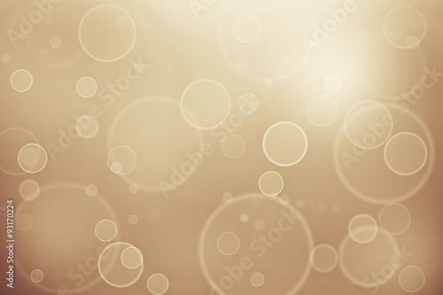 Gold bokeh, pastel gold bubble circle on golden background.