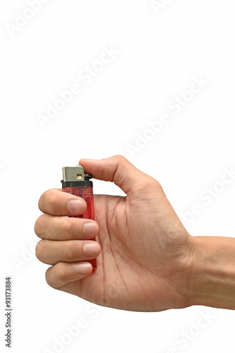 Close-up of a man's hand about to light a lighter.