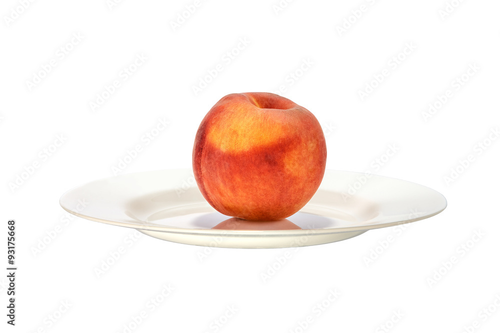 Beautiful peach on a white plate close up. Beautiful peach on a white plate close up.