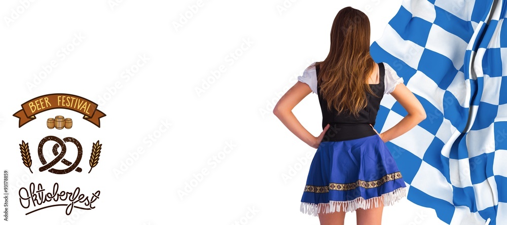 Composite image of oktoberfest girl standing with hands on hips