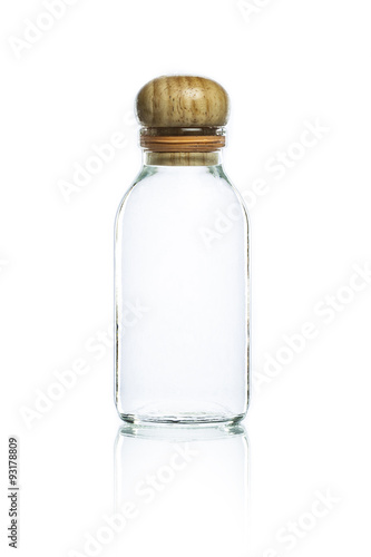 empty glass bottle and wood bottle cork