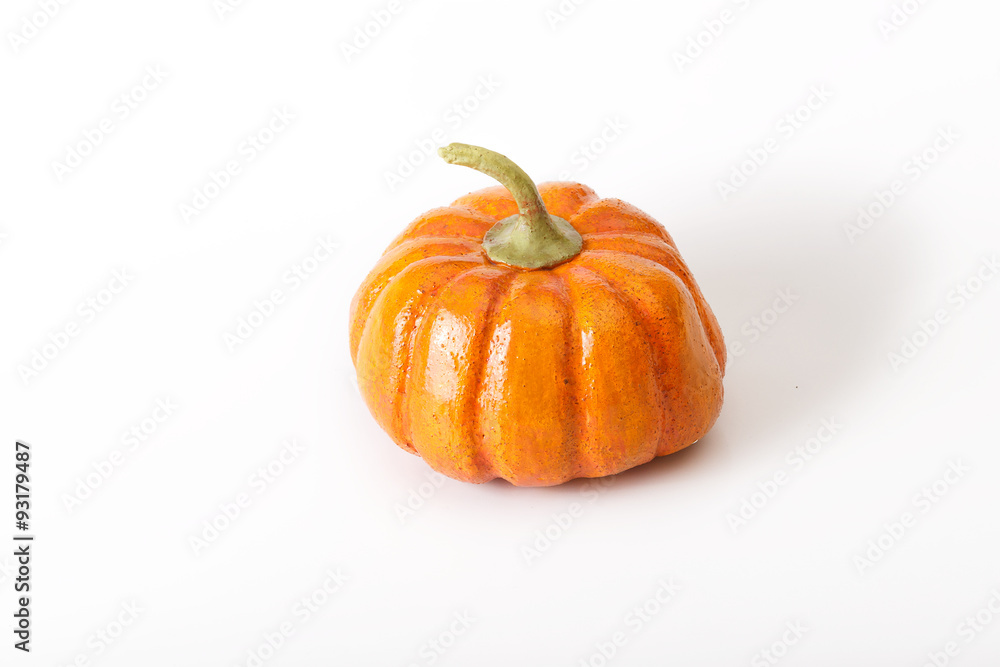 Fototapeta premium Orange halloween pumpkin gift on white background