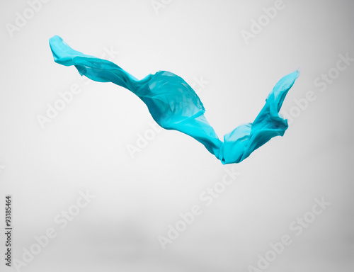 abstract teal fabric in motion