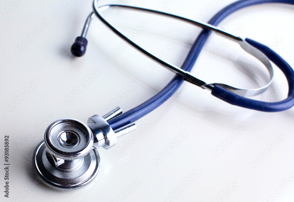 close up medical stethoscope on a white background close up medical stethoscope on a white background