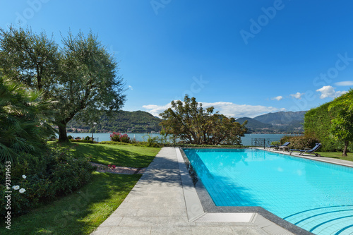 beautiful swimming pool overlooking the lake © alexandre zveiger