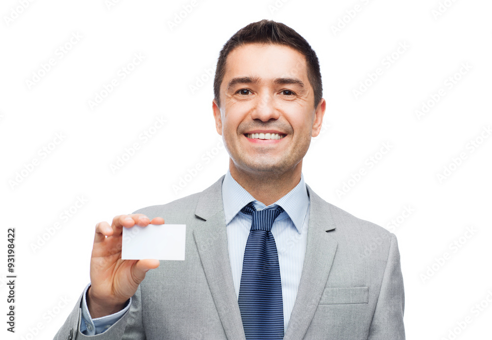 smiling businessman in suit showing visiting card smiling businessman in suit showing visiting card