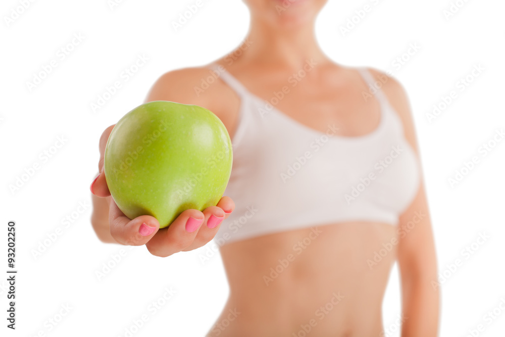 Athletic girl with green apple. Athletic girl with green apple.