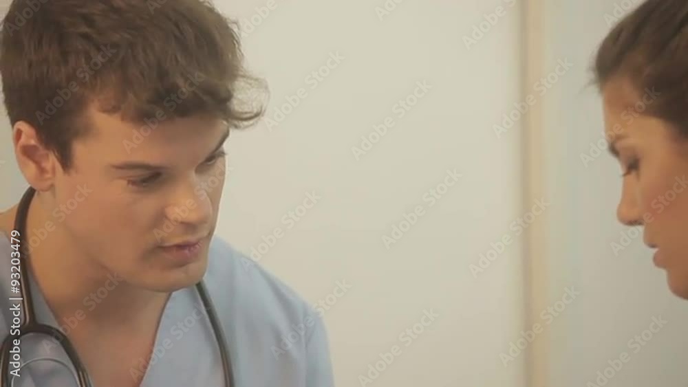 Doctor checking a patient pressuret Doctor checking a patient pressuret