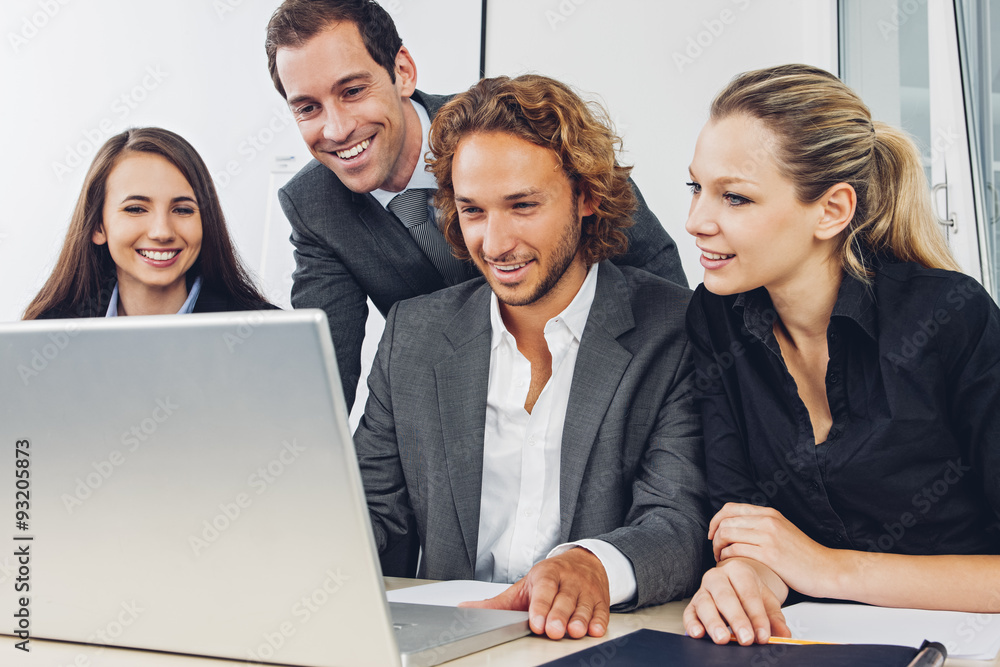 Business people in office working at laptop Business people in office working at laptop
