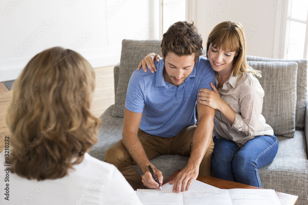 Young couple owners meeting real estate agent for investment Young couple owners meeting real estate agent for investment