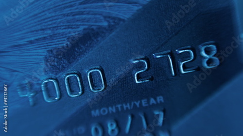Plastic credit cards to withdraw money from a bank account