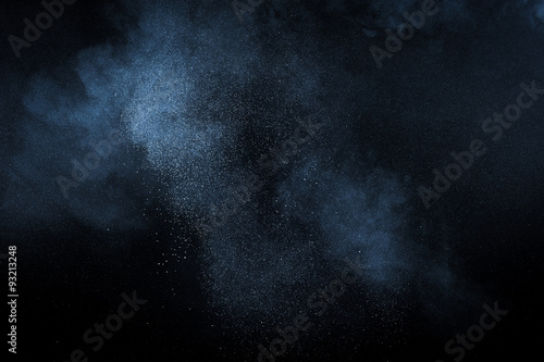 abstract white dust explosion on black background. abstract white powder explosion on black background
