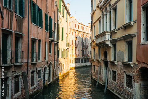 canal and traditional buildings of Venice, Italy. © sola_sola
