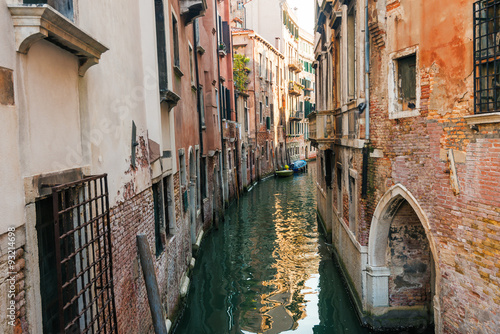 Boats, water canal and traditional buildings, Venice. Italy, Europe. #93214698