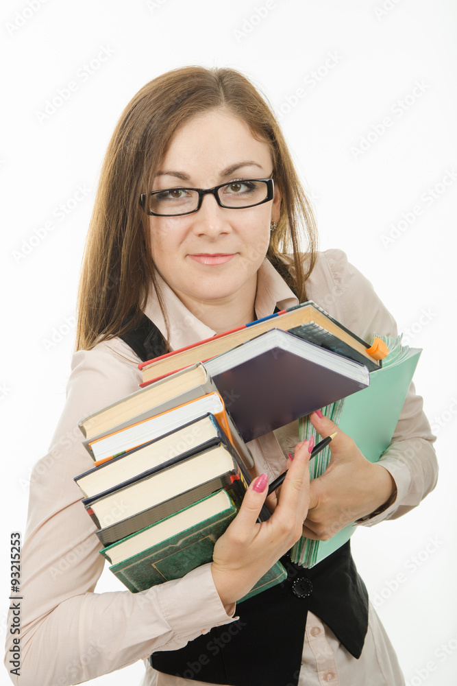 Portrait of a teacher with books and notebooks Portrait of a teacher with books and notebooks