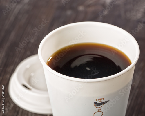 Closeup of takeaway coffee cup with ‘coffee’ checked on the side