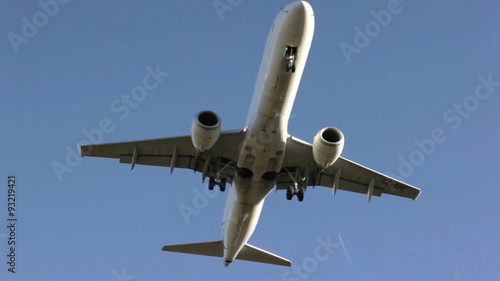 airplan flies over camera