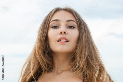 Closeup portrait of beautiful amazed girl outdoor