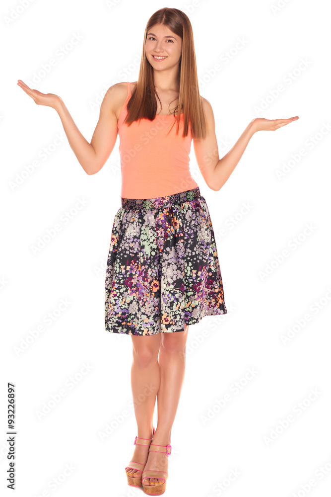 Girl in a shirt and skirt isolated on a white background Girl in a shirt and skirt isolated on a white background