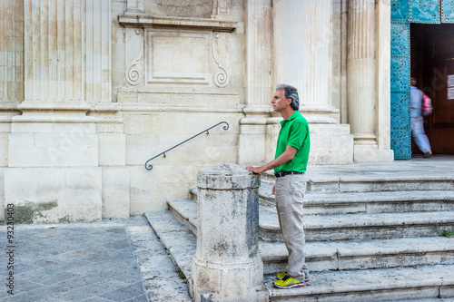 adult among the palaces of Lecce Baroque