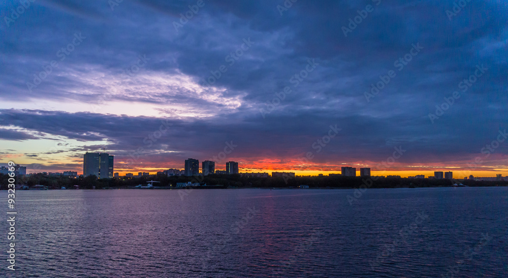 evening sunset of Moscow skyline across the Volga River 
